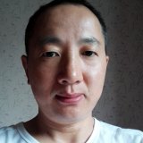 Hongquan Dong Reiseleiter Porträt